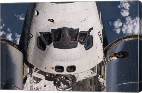Partial view of the crew cabin and forward payload bay of the space shuttle Discovery