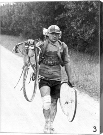 Italian Giusto Cerutti has a broken wheel after a fall. Tour de France 1928