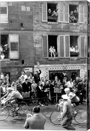 People watching the cyclists being provisioned. Tour de France 1958.