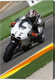 Garry McCoy riding the Ilmor X3 MotoGP