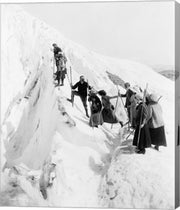 Group of men and women climbing Paradise Glacier in Mt. Rainier National Park, Washington