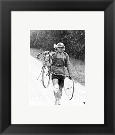Italian Giusto Cerutti has a broken wheel after a fall. Tour de France 1928