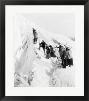 Group of men and women climbing Paradise Glacier in Mt. Rainier National Park, Washington