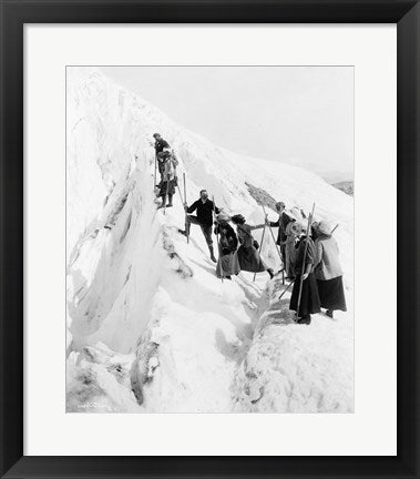 Group of men and women climbing Paradise Glacier in Mt. Rainier National Park, Washington
