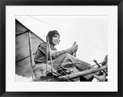 Aviator Helene Dutrieu Seated in Her Airplane