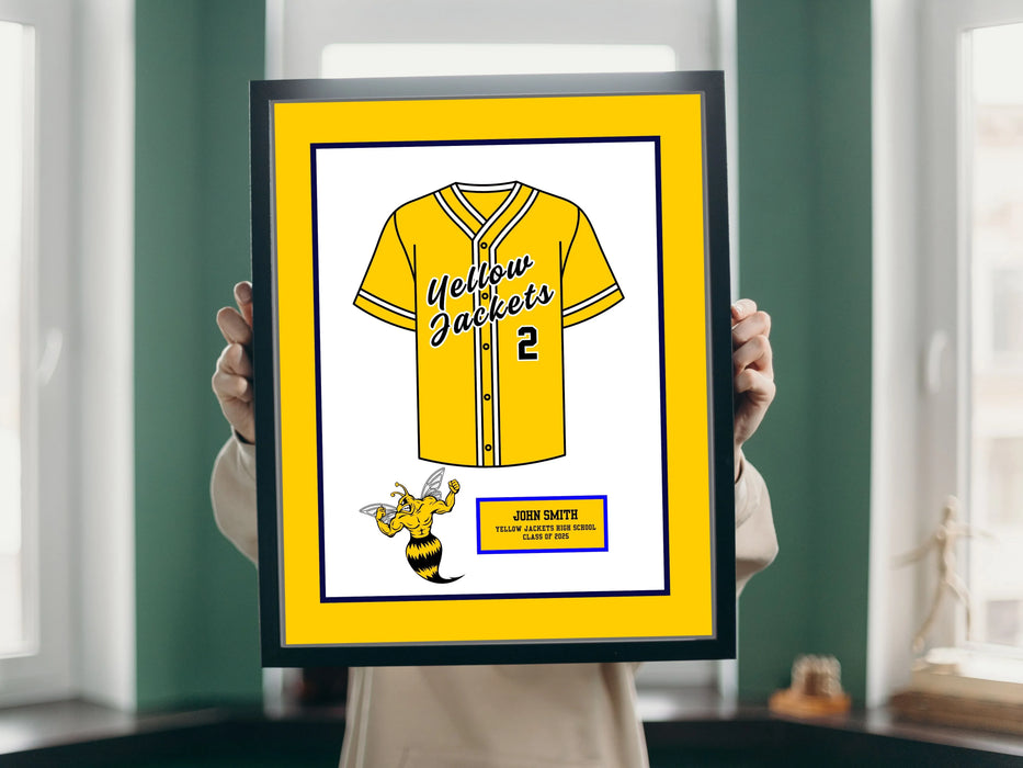 a person holding a framed picture of a baseball uniform